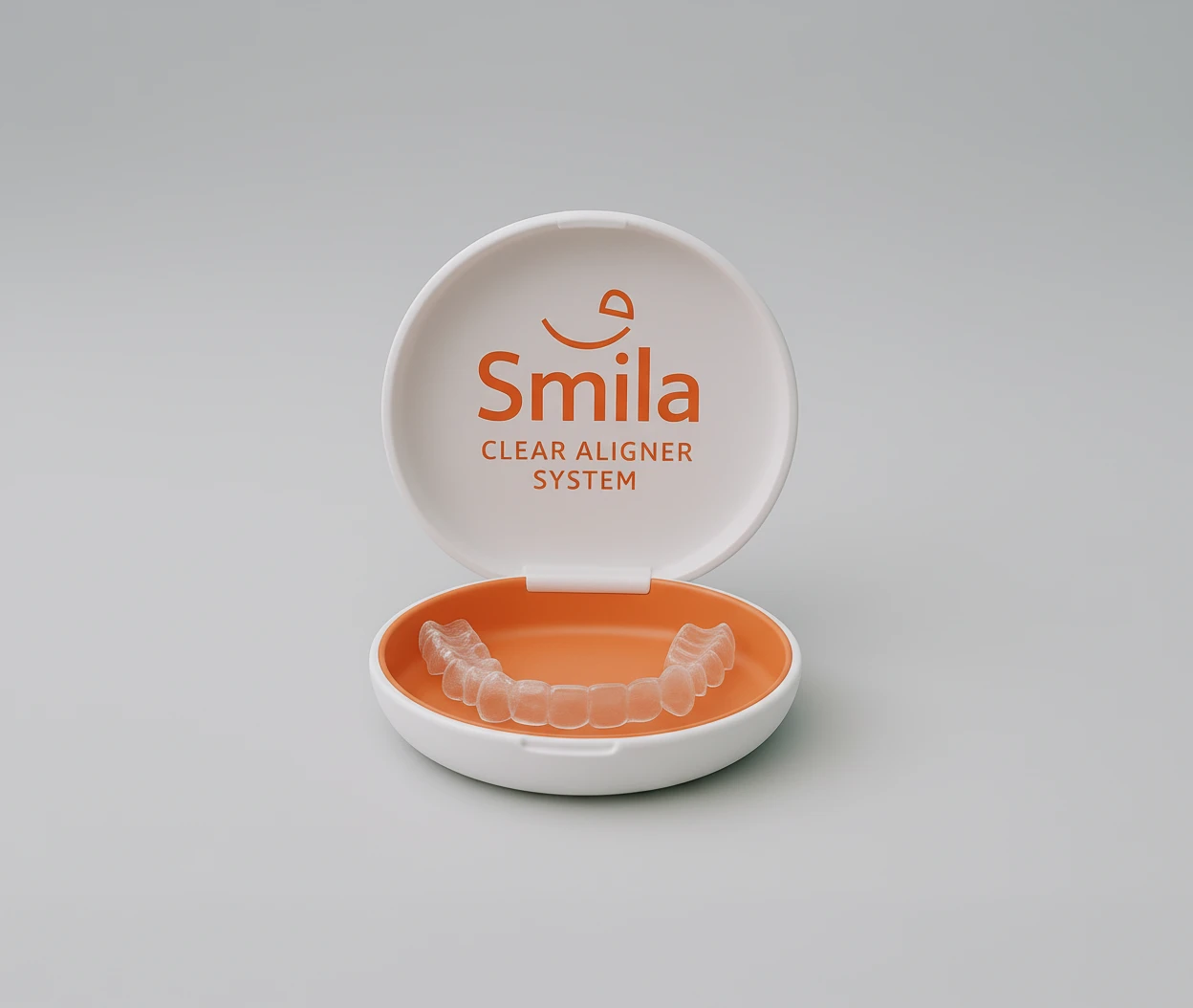 The Smila clear aligner pack — round case with coral interior, opened to show the aligners